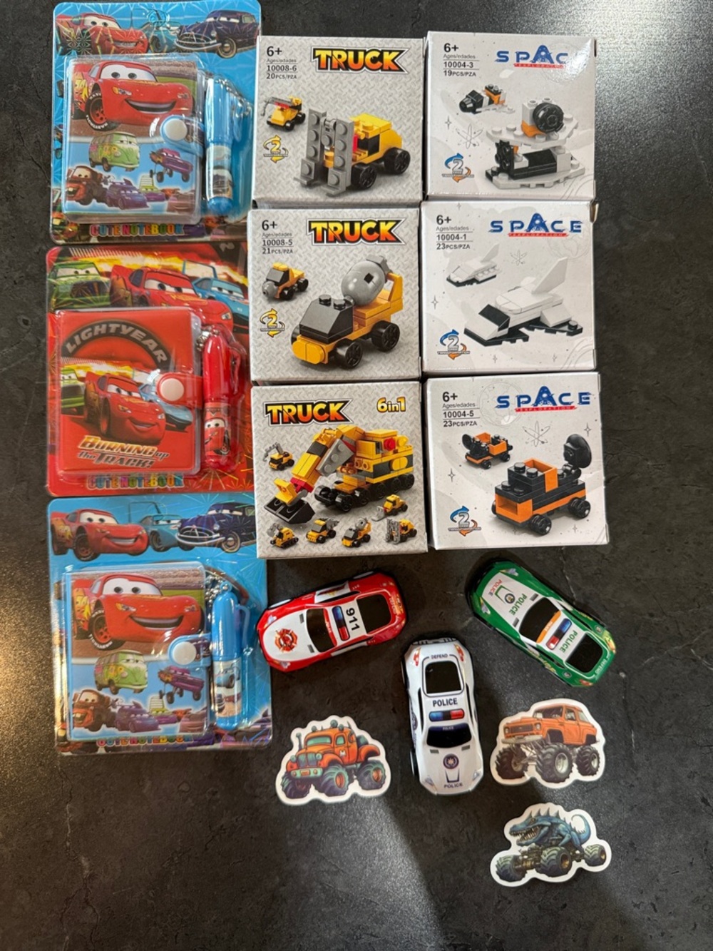 Cars Themed Kids Toy Set with Red, Blue, White, Green Vehicles
Birthday Bundle